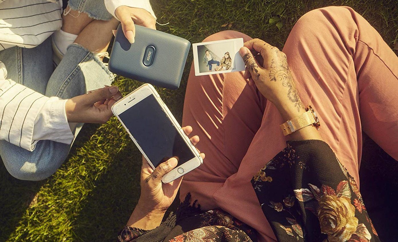 Сравнение Fujifilm Instax Mini Link и Canon Ivy 1